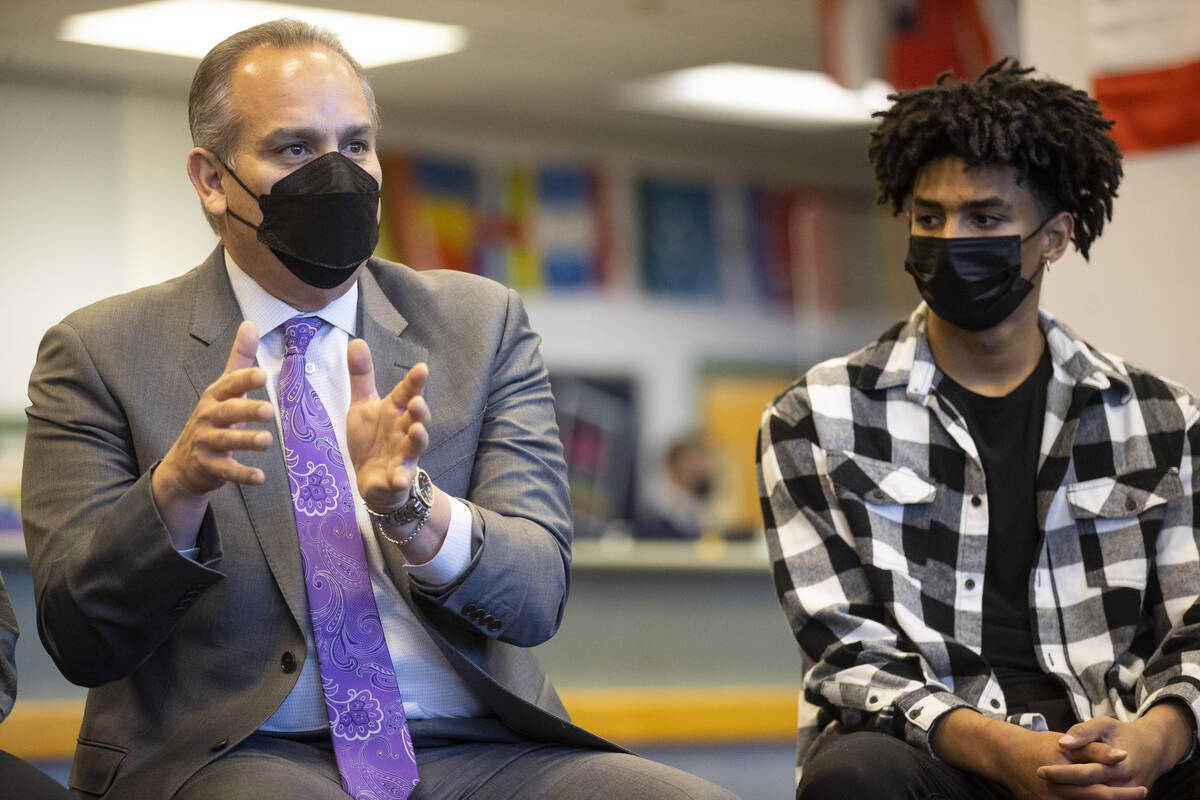Clark County School District Superintendent Jesus Jara, left, with student Alijah Adem, speaks ...