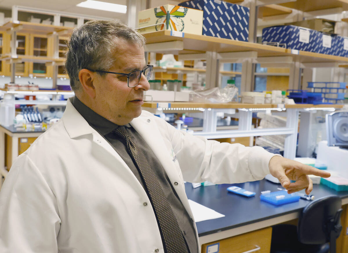 Dr. Martin Schiller, the founder of Heligenics, speaks as he leads a tour of the Heligenics' la ...