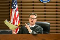 Henderson Justice of the Peace Sam Bateman presides over a case on July 2, 2018. He was hired a ...