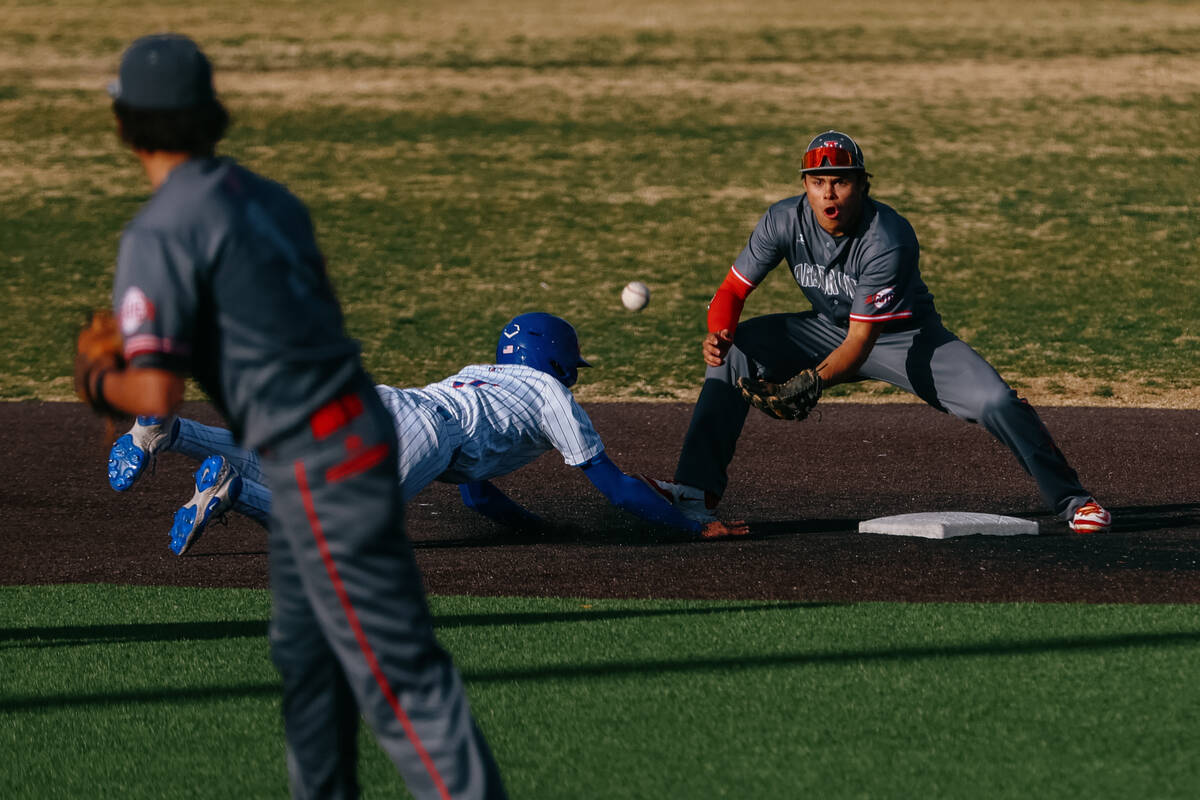 Arbor View second baseman Jase DeSantis (2) tries to put out Bishop Gorman runner Justin Rodrig ...