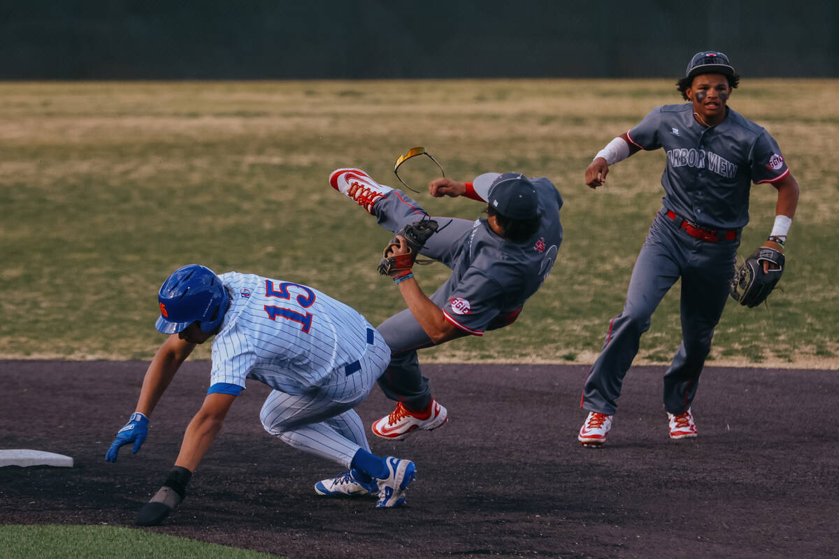 Arbor View outfielder Kash Wieger (3), center, and Bishop Gorman runner Damari Hall (15), left, ...