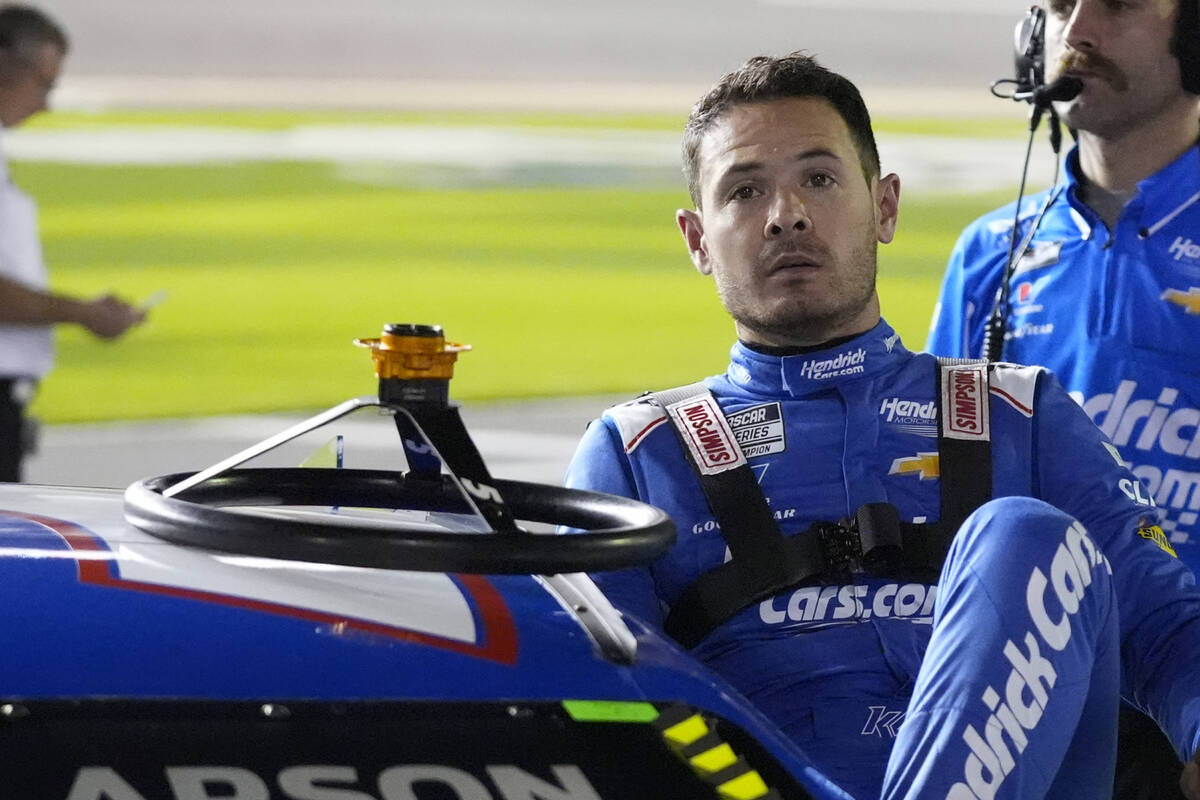 Kyle Larson climbs from his car during qualifying for the NASCAR Daytona 500 auto race at Dayto ...