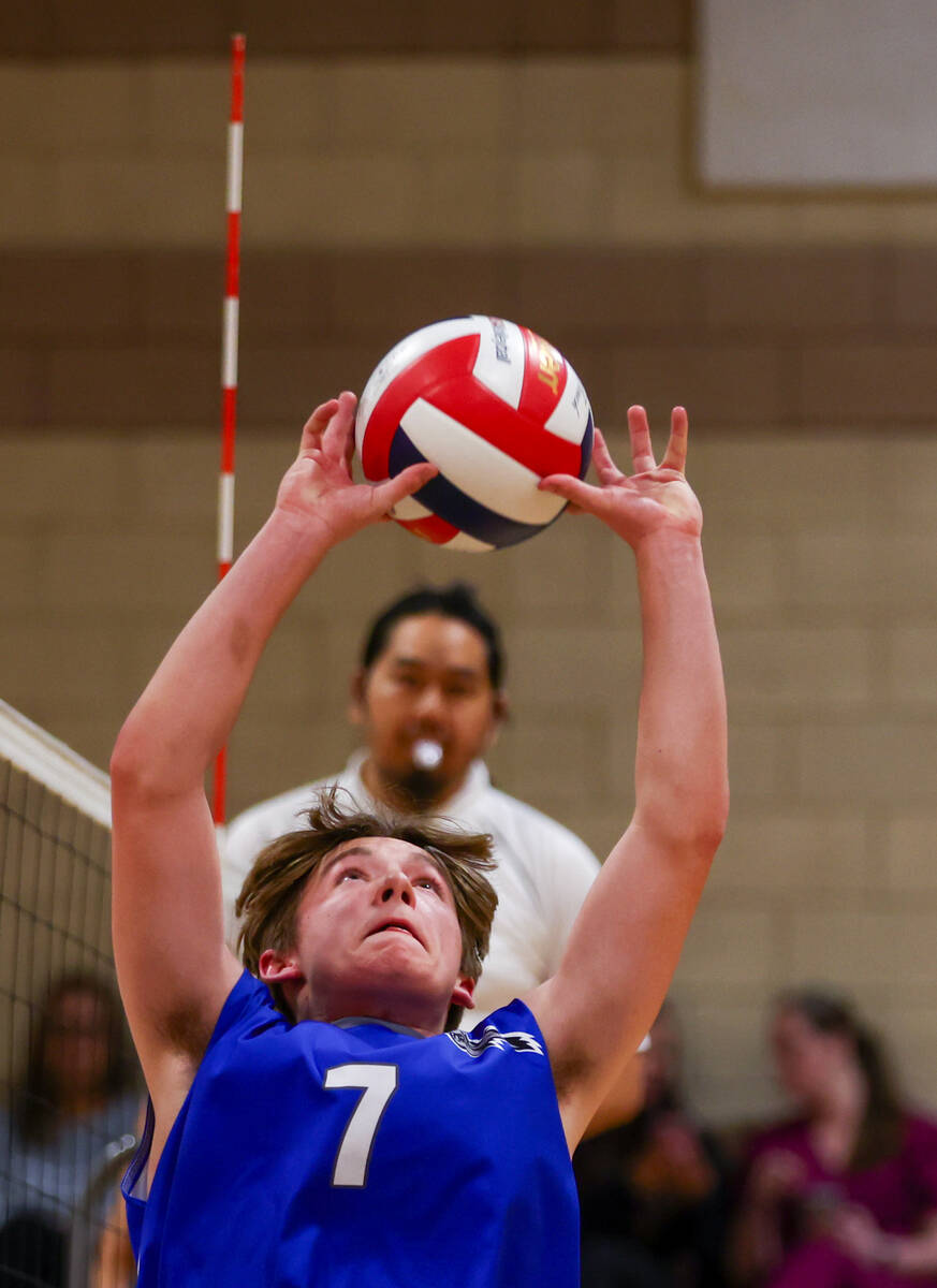 Basic setter Derek Dennett (7) sets to a teammate during the volleyball game against Somerset S ...