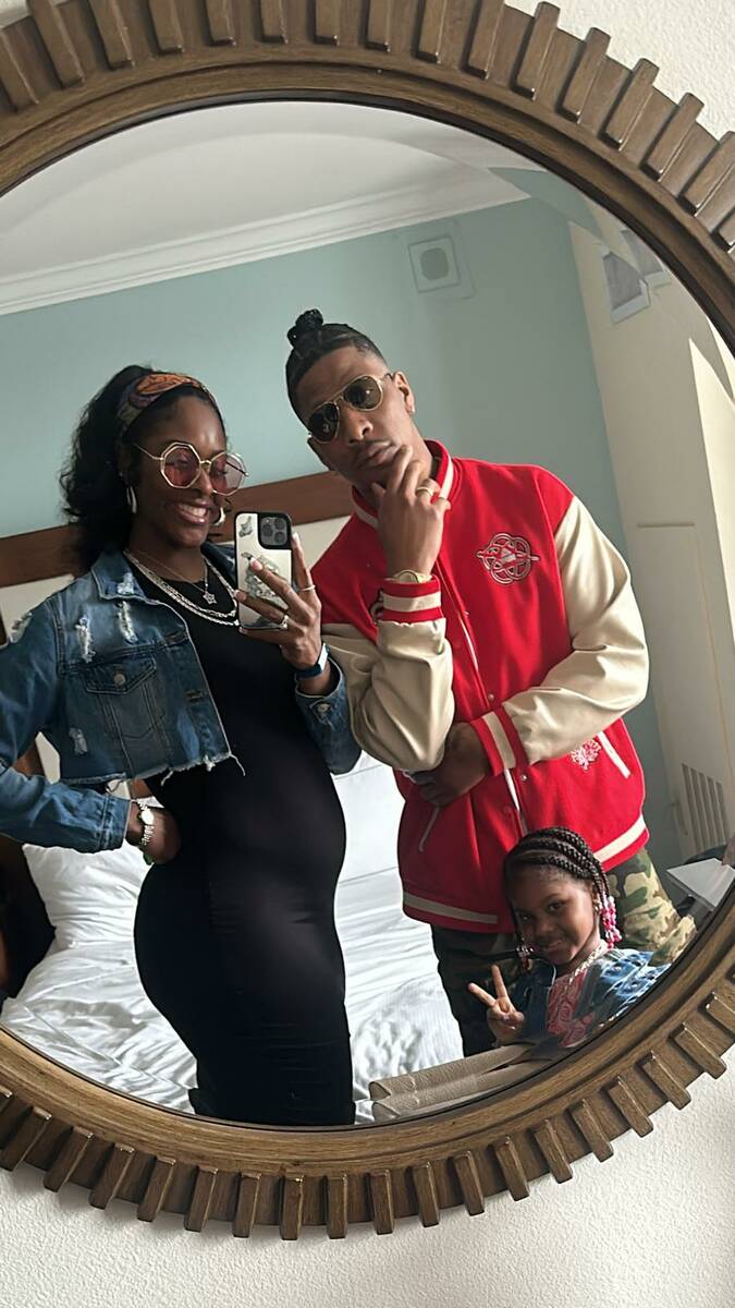 The Tyus family — Cheyenne Parker-Tyus, husband Keevin Tyus and daughter Naomi — pose toget ...