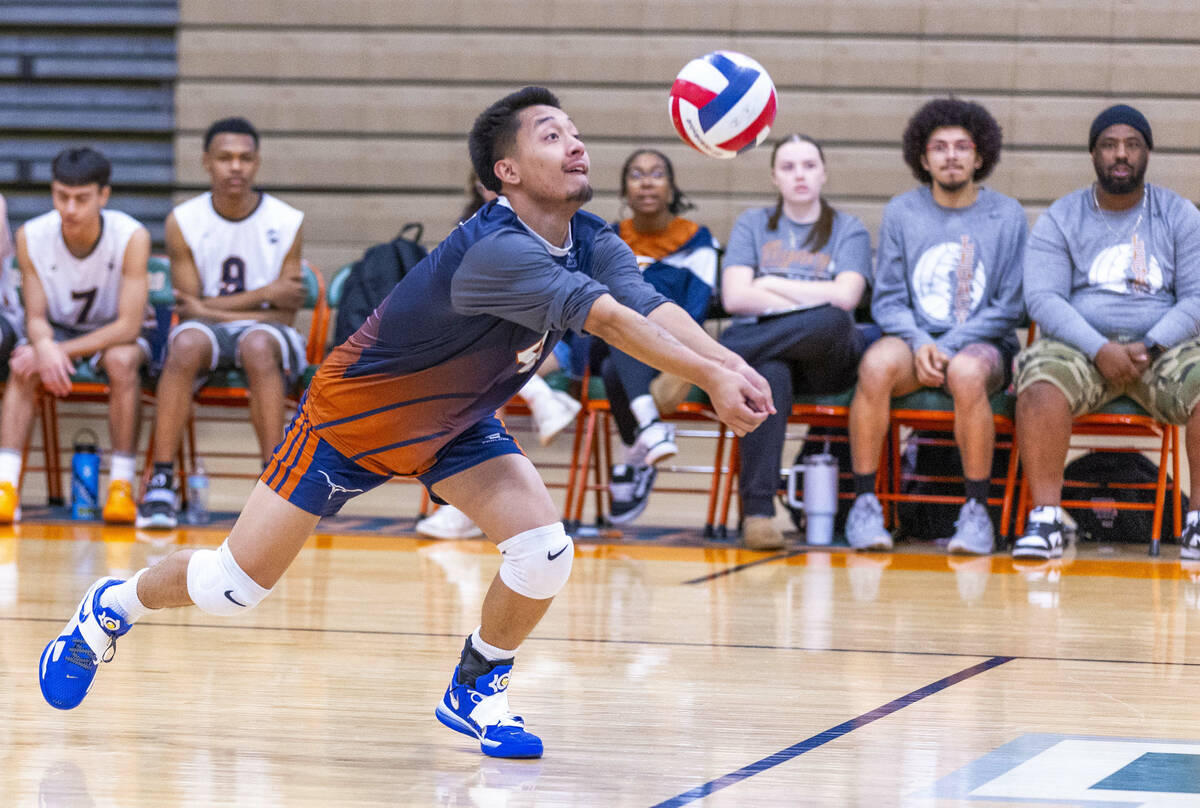 Legacy's Jacob Bay (4) digs out a return against Mojave during their 4A boys volleyball game on ...