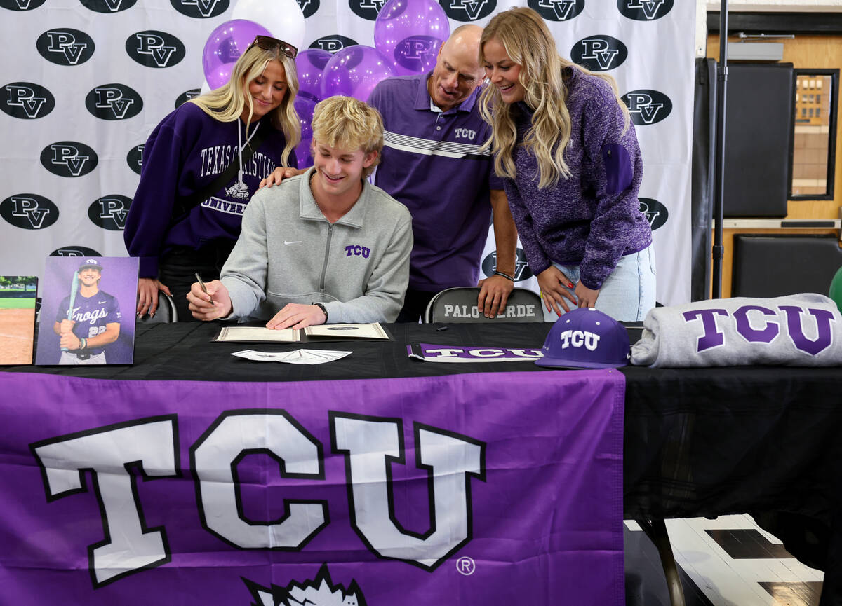 Palo Verde baseball player Brady Dallimore signs a financial aid agreements for Texas Christian ...