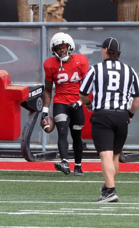 UNLV running back Darrien Jones (24) celebrates a touchdown during a team scrimmage at Bill 'Wi ...