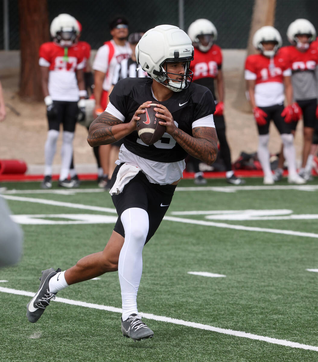 UNLV quarterback Cameron Friel (13) looks to throw during a team scrimmage at Bill 'Wildcat' Mo ...