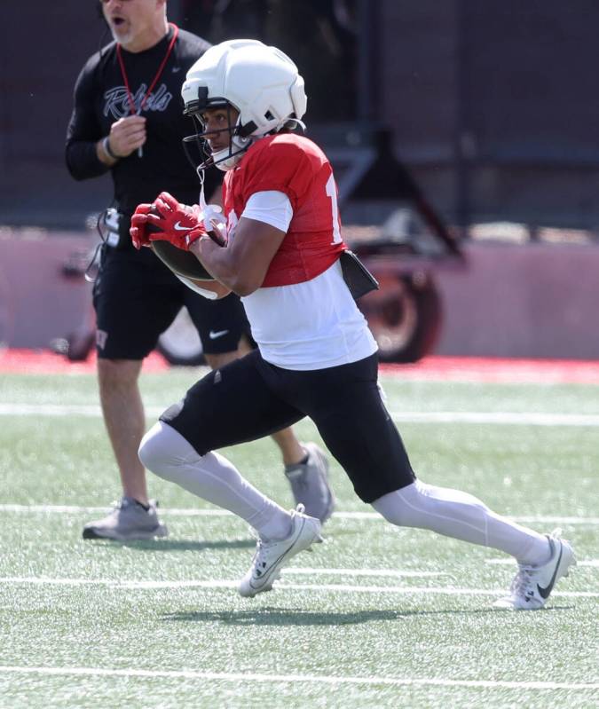 UNLV wide receiver DeAngelo Irvin Jr. (18) returns a punt during a team scrimmage at Bill 'Wild ...