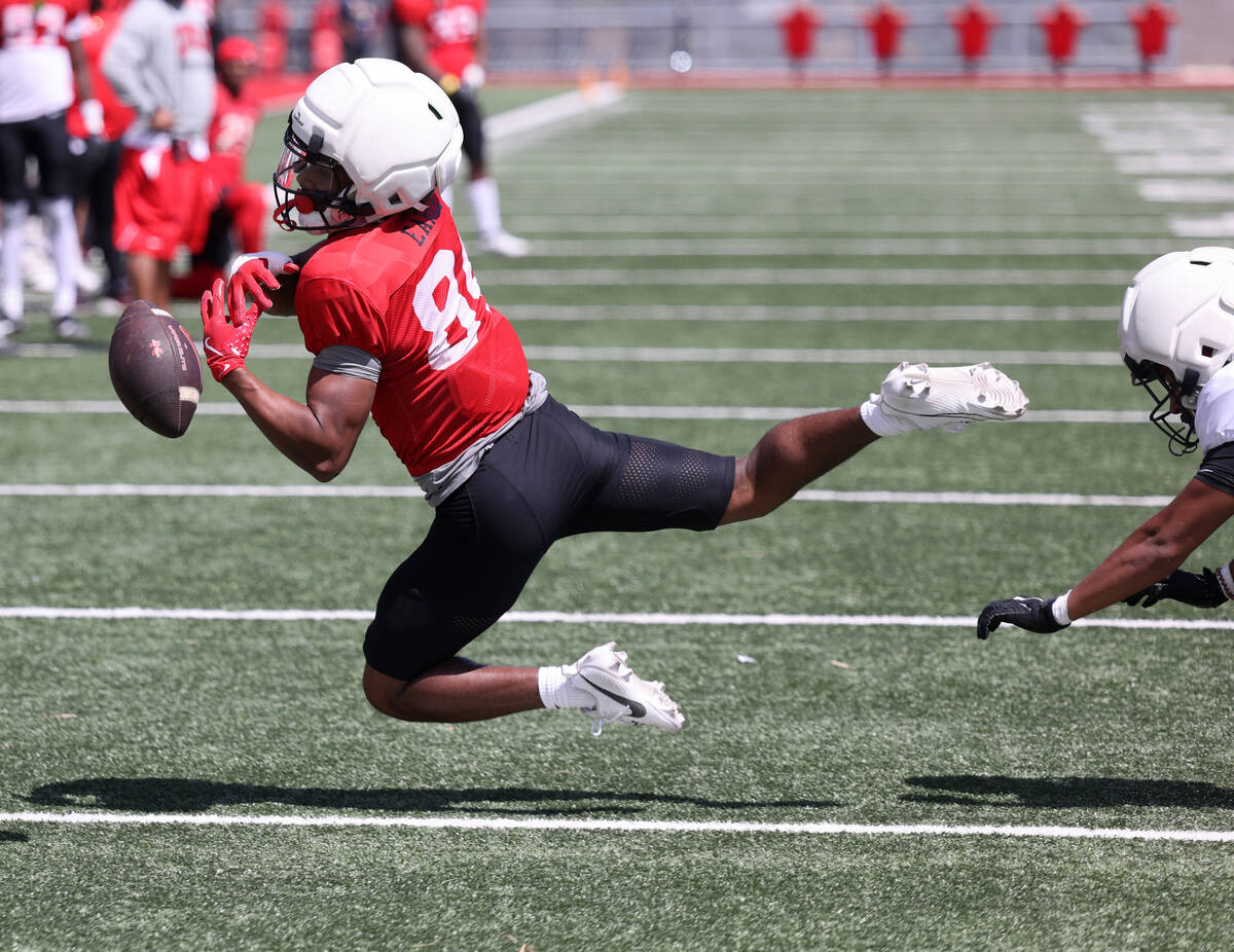 UNLV wide receiver Gary “Jojo” Earle (84) tries to pull in a pass during a team s ...