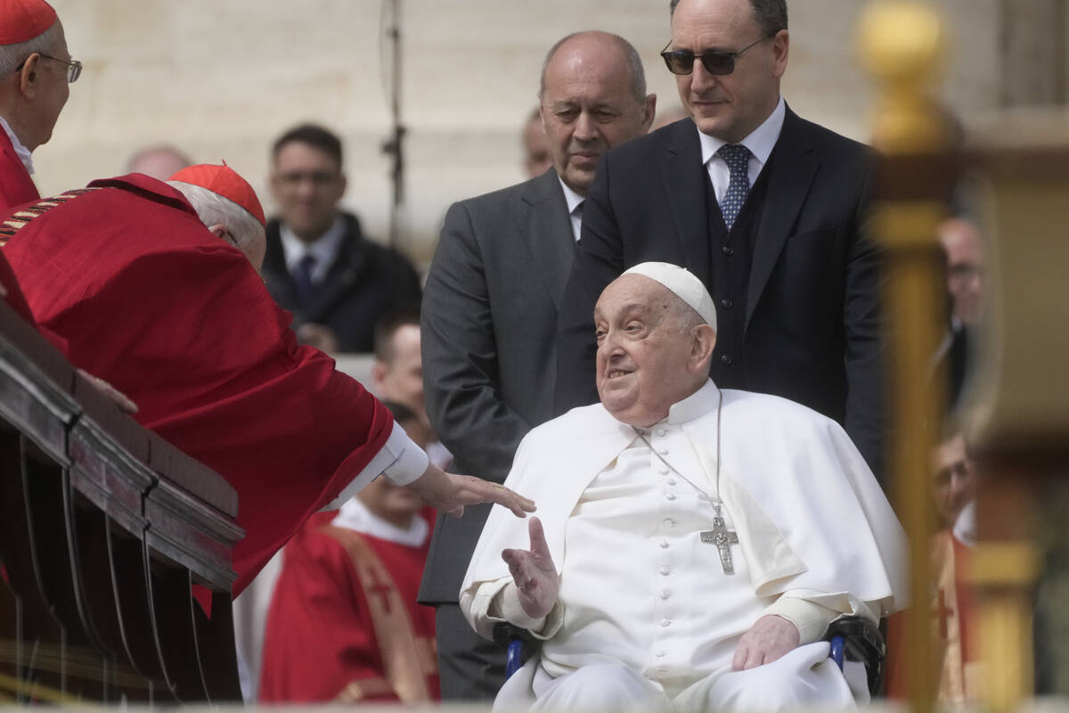 Pope Francis arrives at the end of the mass on Palm Sunday in St. Peter's Square at The Vatican ...