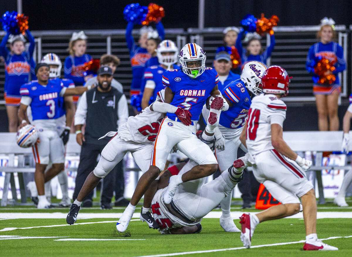 Bishop Gorman defensive back Jett Washington (5) runs back an interception against Arbor View d ...