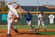 Bishop Gorman’s Jonas Yatson (27) gets ready to run to third base during a baseball game ...