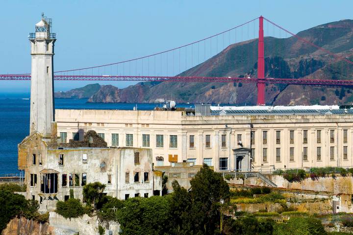The Golden Gate Bridge stands behind Alcatraz Island on Monday, May 5, 2025, in San Francisco. ...