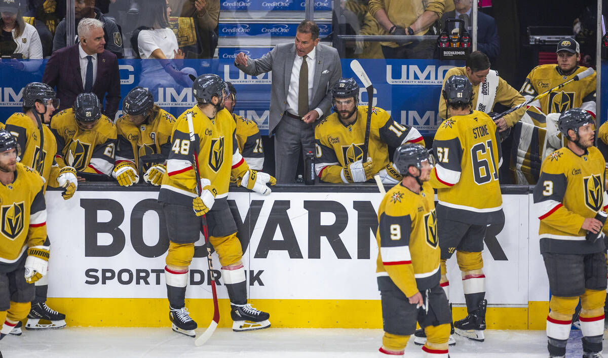 Golden Knights head coach Bruce Cassidy speaks with his players on a time out against the Edmon ...