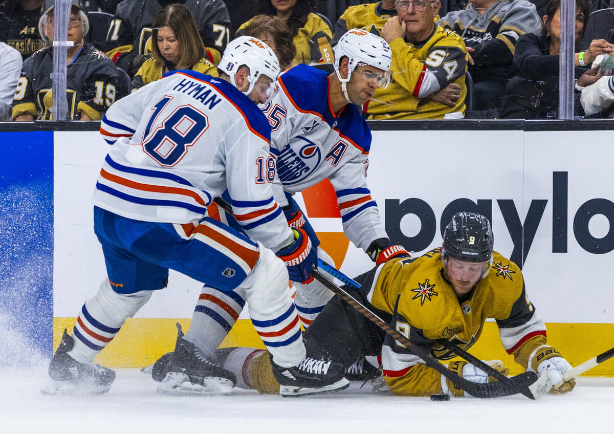 Golden Knights center Jack Eichel (9) goes to the ice to chase a puck against Edmonton Oilers d ...