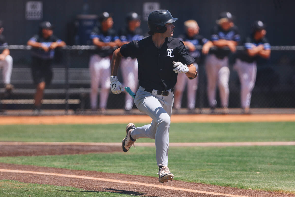 Faith Lutheran outside fielder Ace Hansen runs to first base during a 5A baseball Southern Regi ...