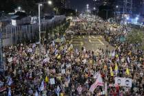 People take part in a protest in Tel Aviv, Israel, Saturday, May 10, 2025, demanding the immedi ...