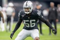 Raiders linebacker Amari Burney (56) warms up before an NFL game against the Denver Broncos at ...