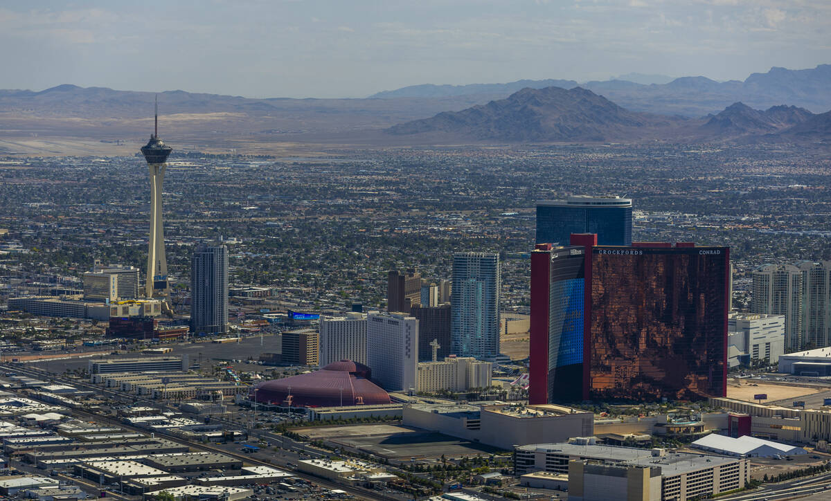 The Goodyear blimp cruises past the North Strip area, the craft in town to provide aerial cover ...