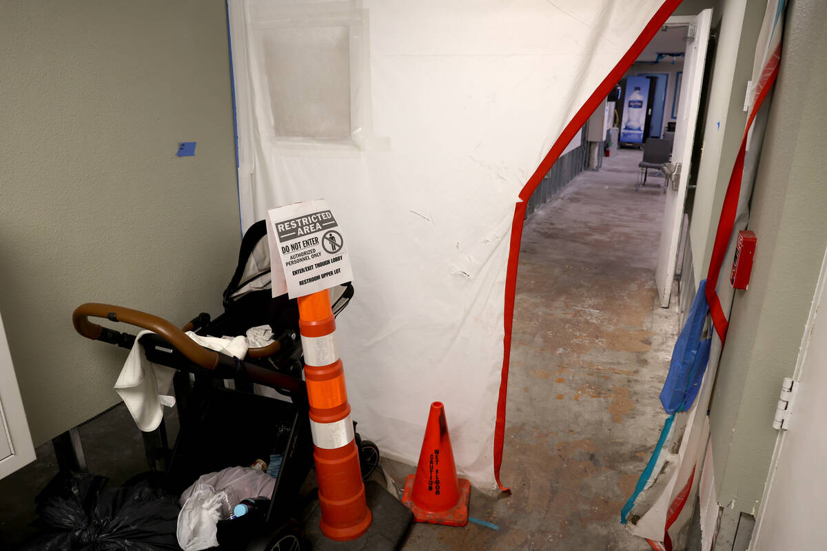 Renovations continue during a press conference at The Shade Tree women, children and pets shelt ...