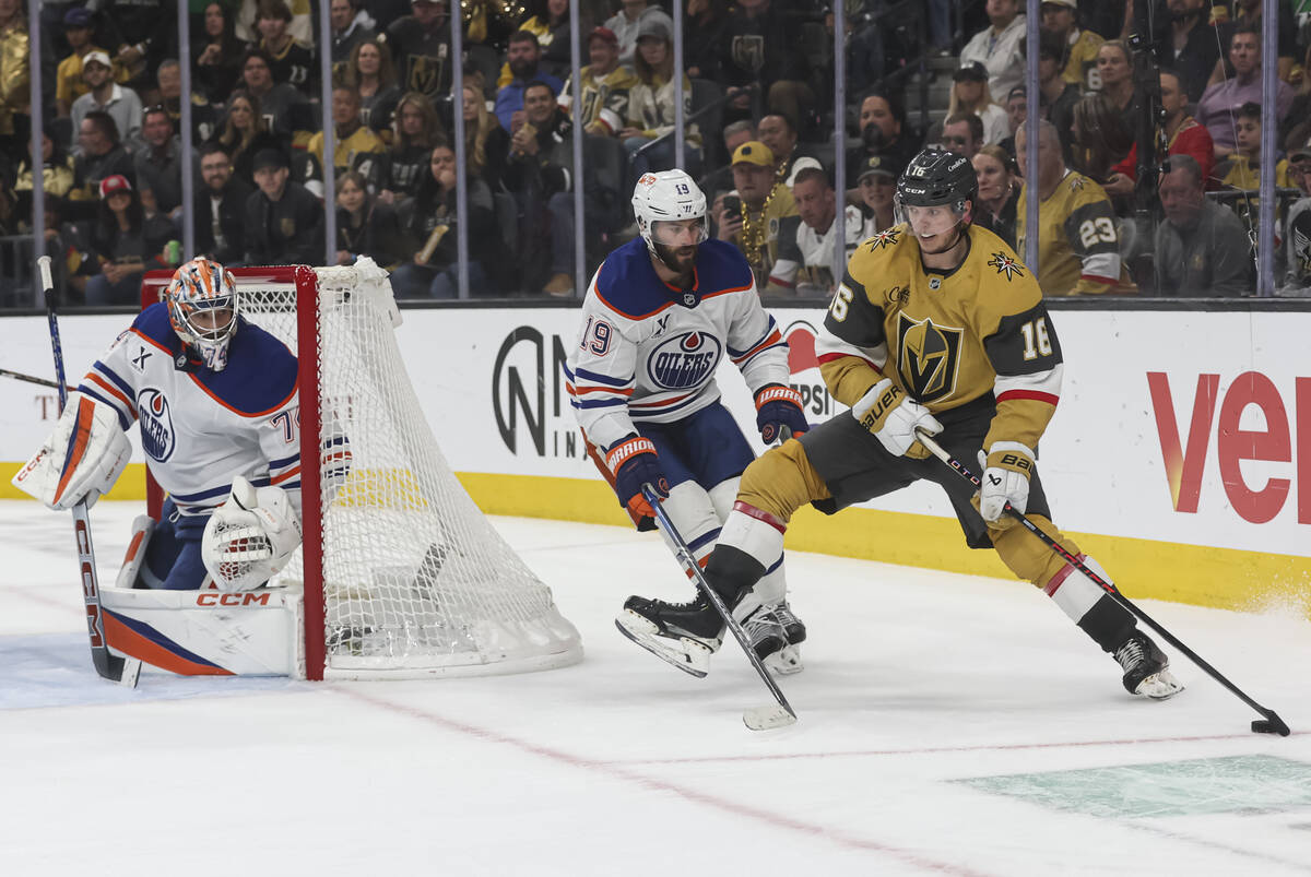 Golden Knights left wing Pavel Dorofeyev (16) tries to get around Edmonton Oilers center Adam H ...