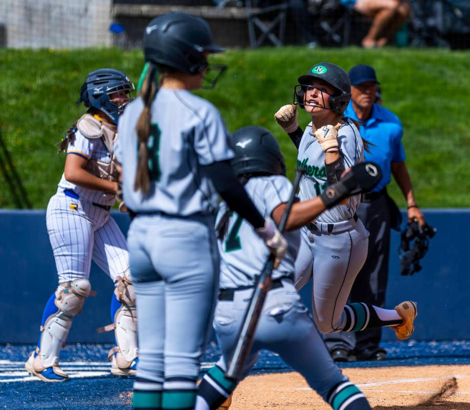 Palo Verde batter Taylor Johns (11) scores against Reed during day one of the 5A softball state ...