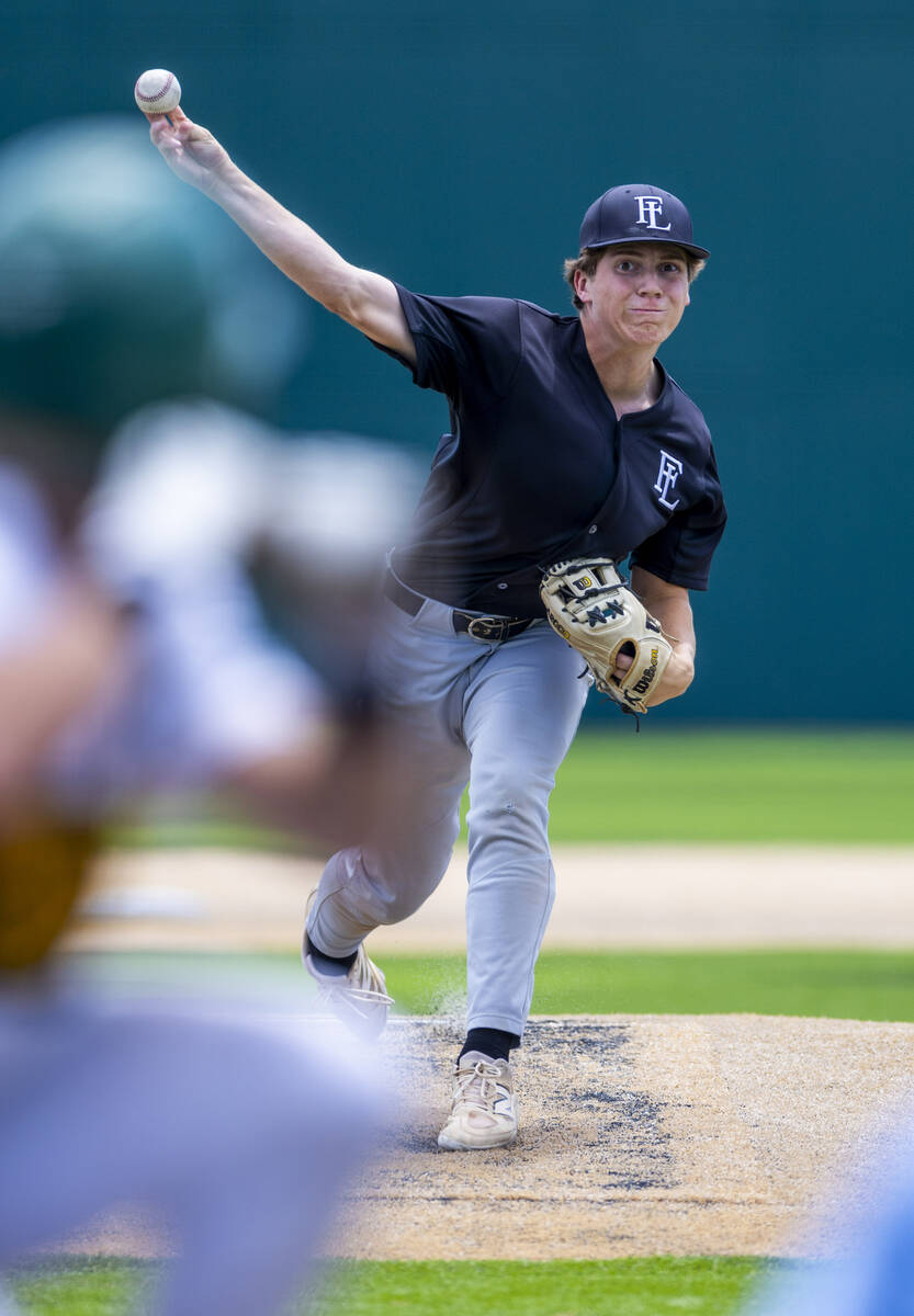 Faith Lutheran pitcher Jordan Watkins (19) winds up against Bishop Manogue during day one of th ...