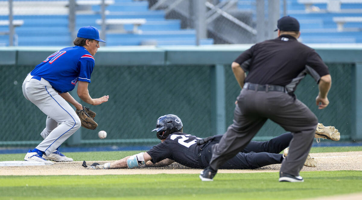 Faith Lutheran runner Macen Collura (23) slides to third safely as the ball gets past Reno infi ...