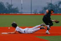 Durango runner Aiden Farrell (4) successfully steals second base after a flubbed pass to Silver ...