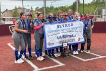 The Basic softball team celebrates its second consecutive Class 4A state championship on Saturd ...