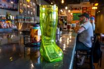 A large boot for tips sits on the counter at the Mojave Brewing Co. as the ‘No Tax on Ti ...