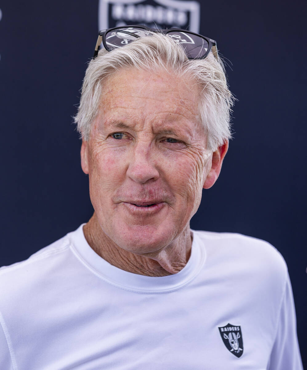 Raiders head coach Pete Carroll speaks to the media during Raiders OTA practice at the Intermou ...