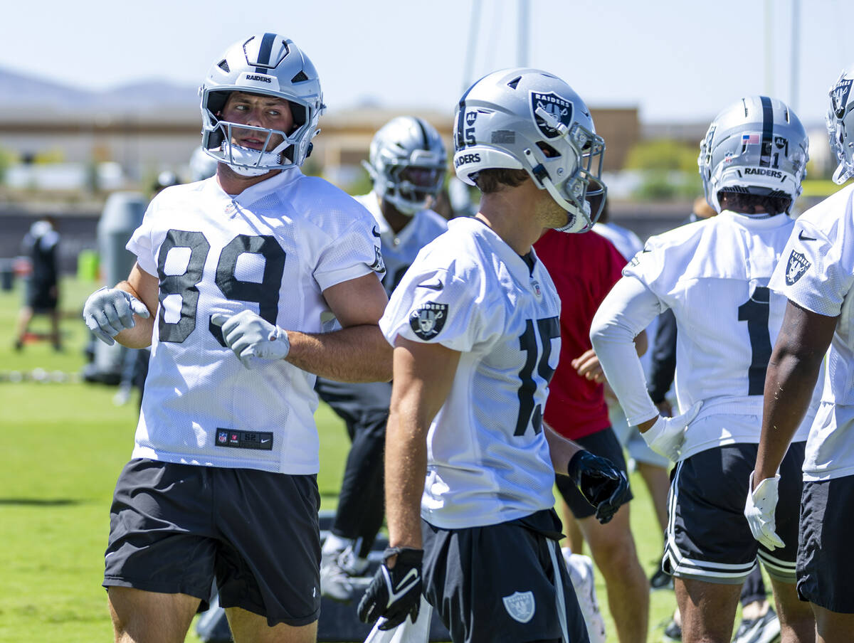Raiders tight end Brock Bowers (89) runs a drill with teammates during Raiders OTA practice at ...