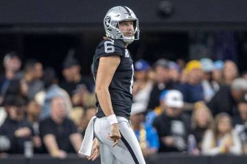 Raiders punter AJ Cole (6) watches his punt after kicking against the Los Angeles Chargers dur ...