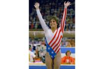 Mary Lou Retton reacts to applause after her performance at the Summer Olympics in Los Angeles ...
