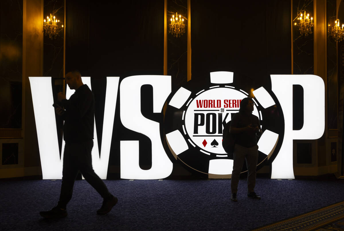 Attendees pass by signage for the World Series of Poker on Tuesday, May 27, 2025, at Paris Las ...