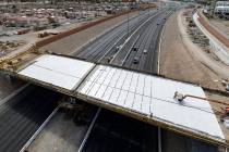 Crews pour concrete on the new Peace Way Bridge over the 215 Beltway, on Saturday, March 1, 202 ...