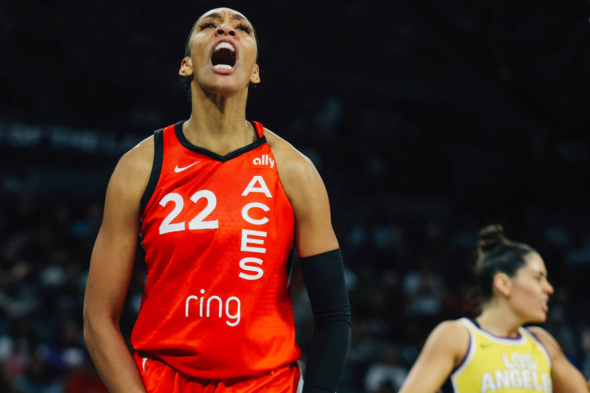 Aces center A'ja Wilson (22) celebrates drawing a foul during a WNBA basketball game between th ...