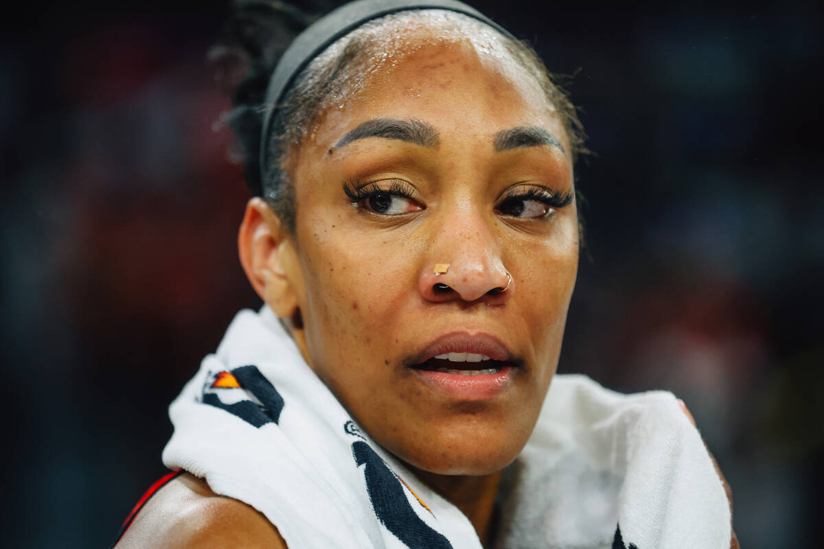 Aces center A'ja Wilson looks to the sidelines during a WNBA basketball game between the Aces a ...