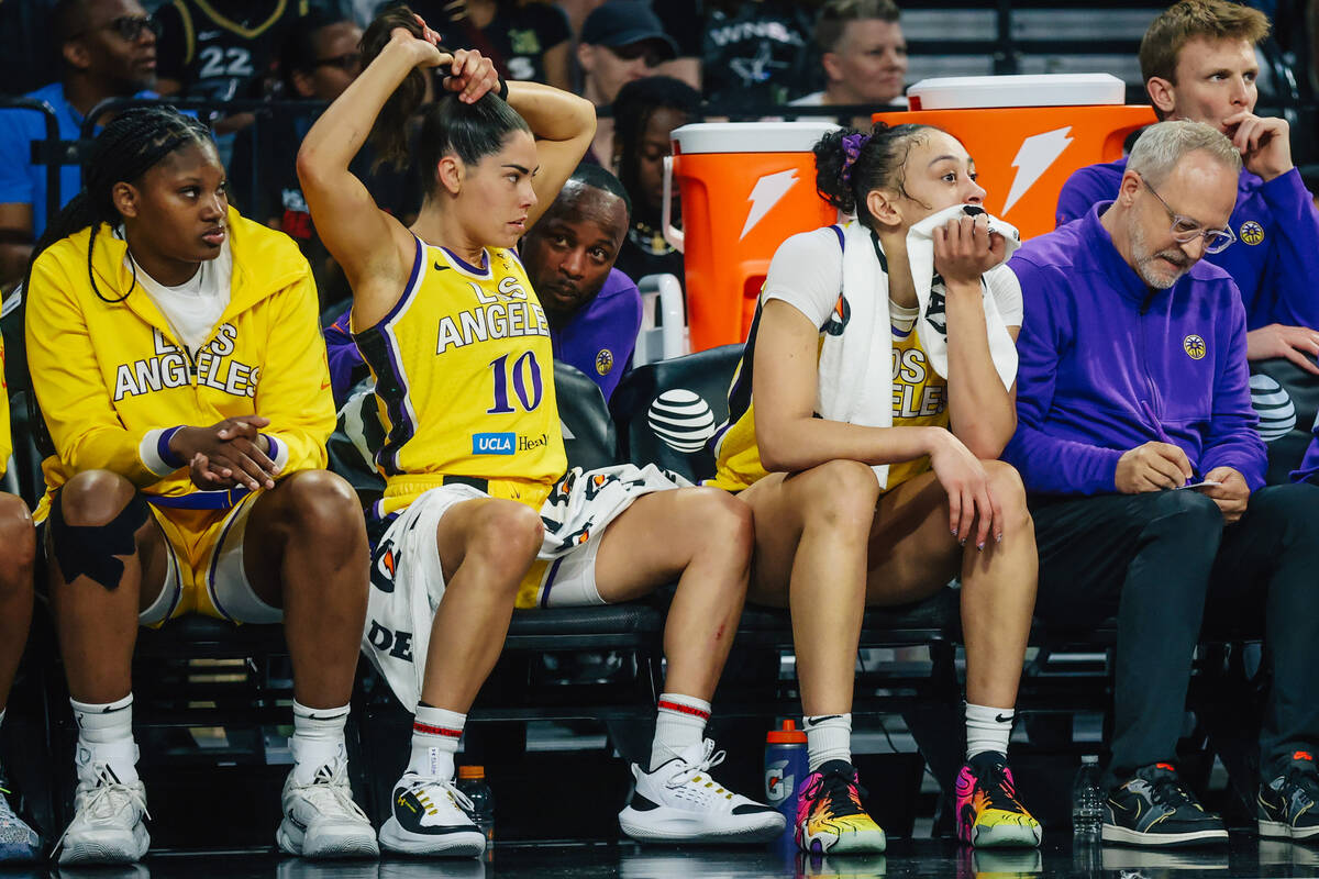 Los Angeles Sparks guard Kelsey Plum (10) and Los Angeles Sparks forward Dearica Hamby (5) sit ...