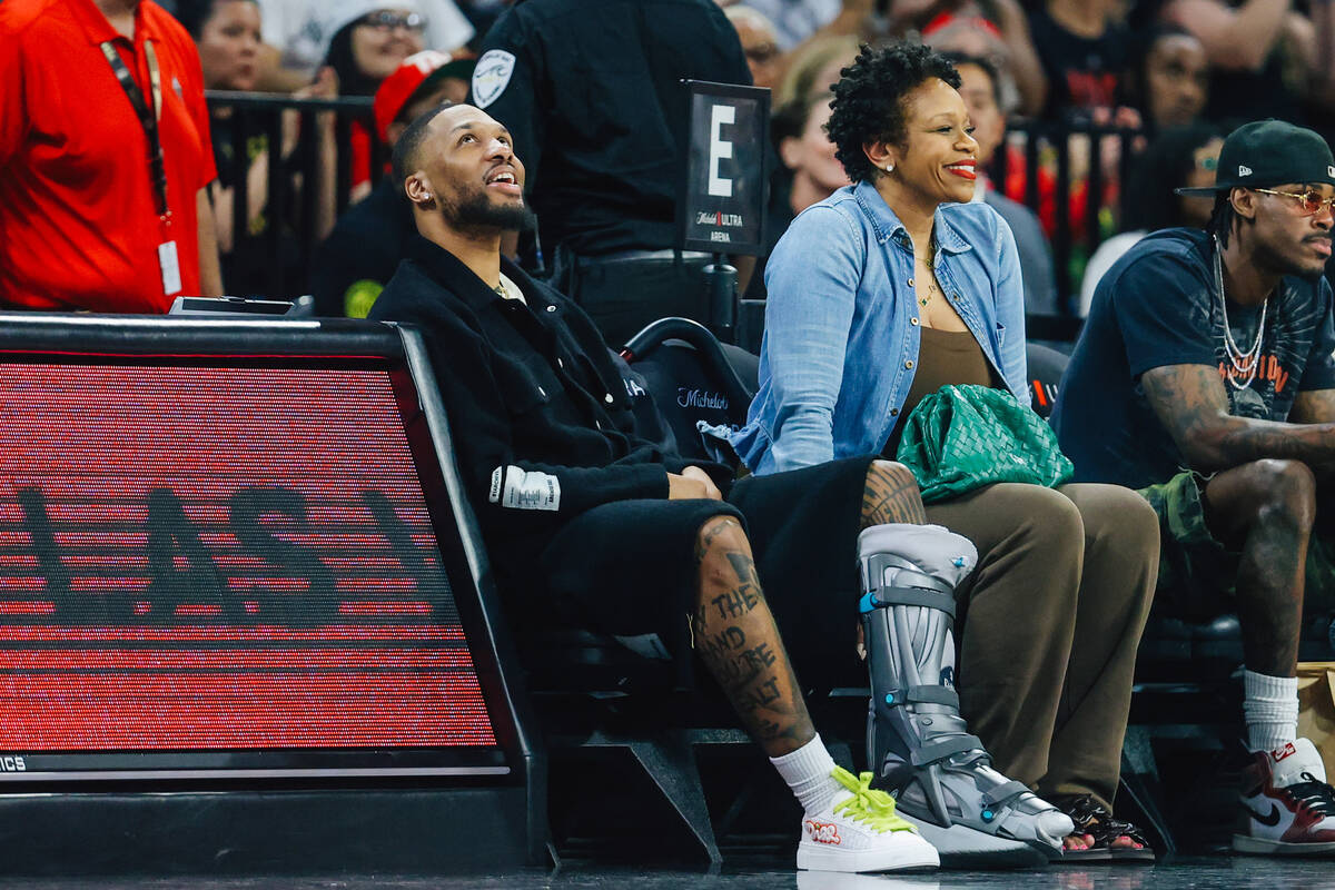 Milwaukee Bucks star Damian Lillard, left, and Tina Thompson, four time WNBA champion, sit toge ...
