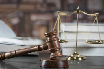 Clark County is warning of a scam in which people are being urged to click on a link sent via t ...
