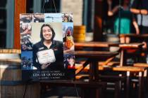 Signs are put out for a memorial gathering for Edgar Quinonez at HUDL Brewing Co. on Saturday, ...