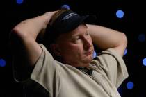Steve Dannenmann of Severn, Md., looks across the table before betting $5 million in chips on t ...