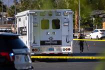 Metropolitan Police Department officers investigate the scene of a homicide at the 3600 Block o ...