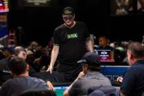 Phil Hellmuth leaves the table after getting knocked out during day 3 of the World Series of Po ...