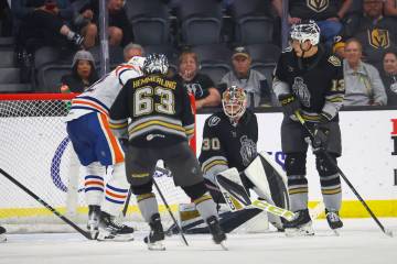 Silver Knights goaltender Carl Lindbom (30) defends the net during an AHL hockey game against t ...